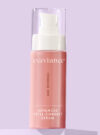 Exuviance produkten advanced total correct serum mot lila bakrund.