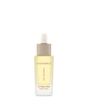 Exuviance produkten citrafirm face oil mot en vit bakrund.