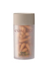 Exuviance produkten vitamin C serum capsules mot vit bakrund.