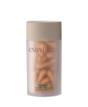 Exuviance produkten vitamin C serum capsules mot vit bakrund.