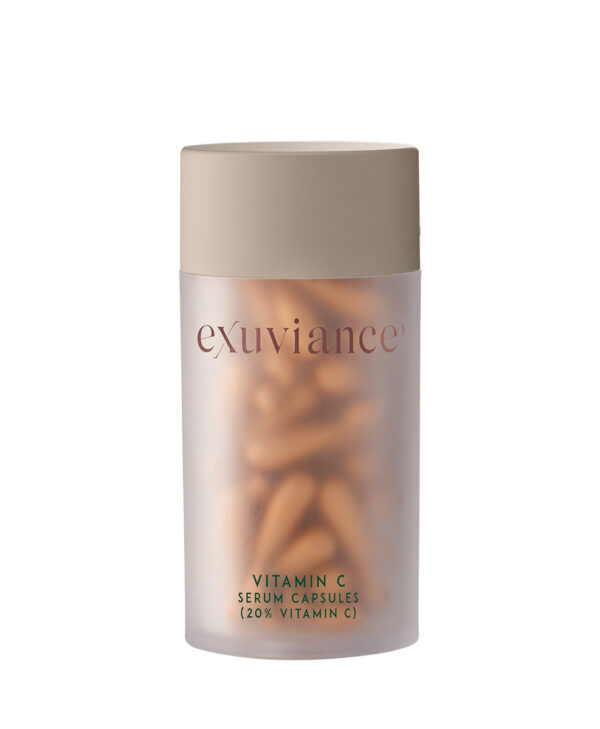 Exuviance produkten vitamin C serum capsules mot vit bakrund.