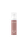 Exuviance produkten advanced total correct serum mot en vit bakrund.